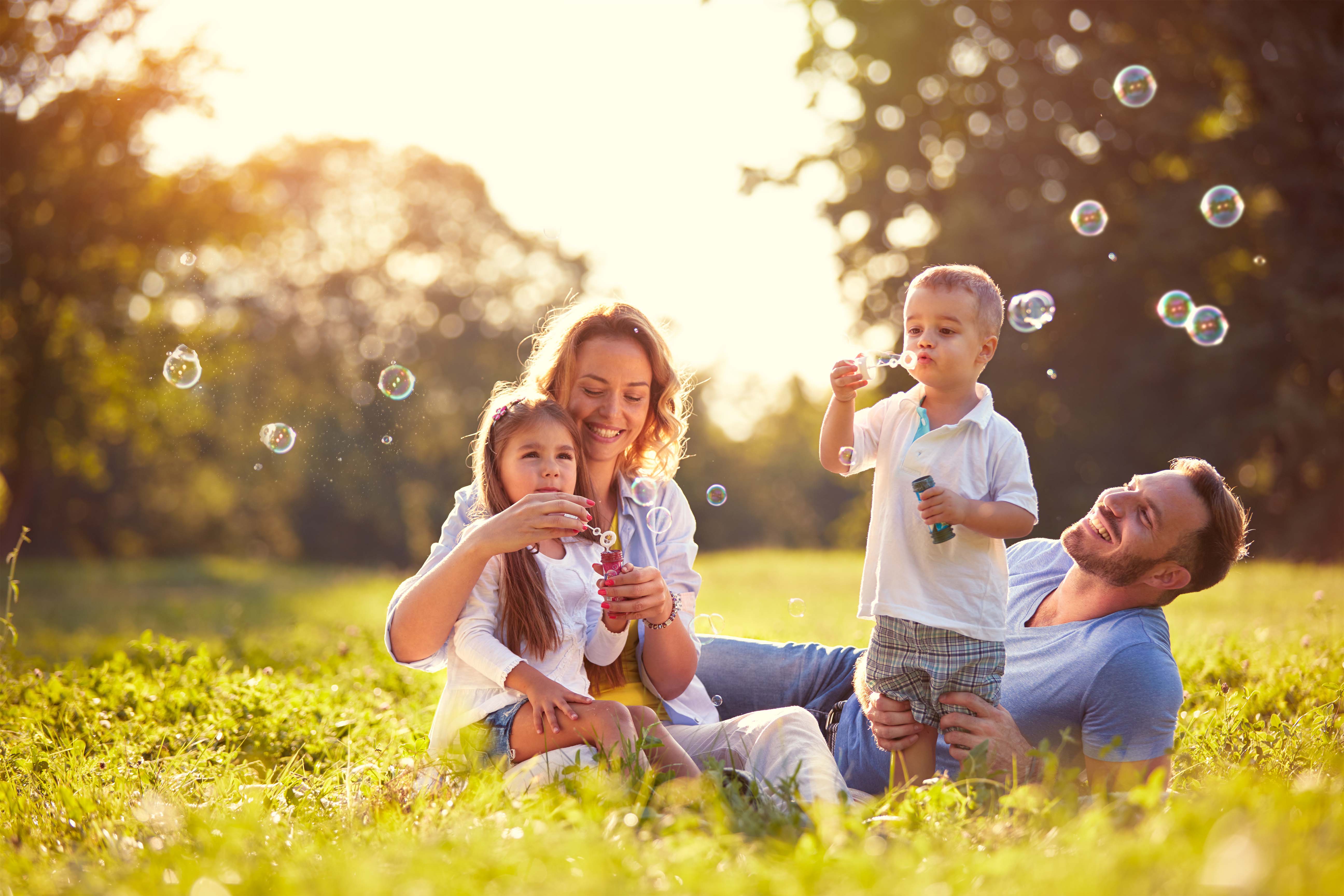 A mother enjoying with her children at the park