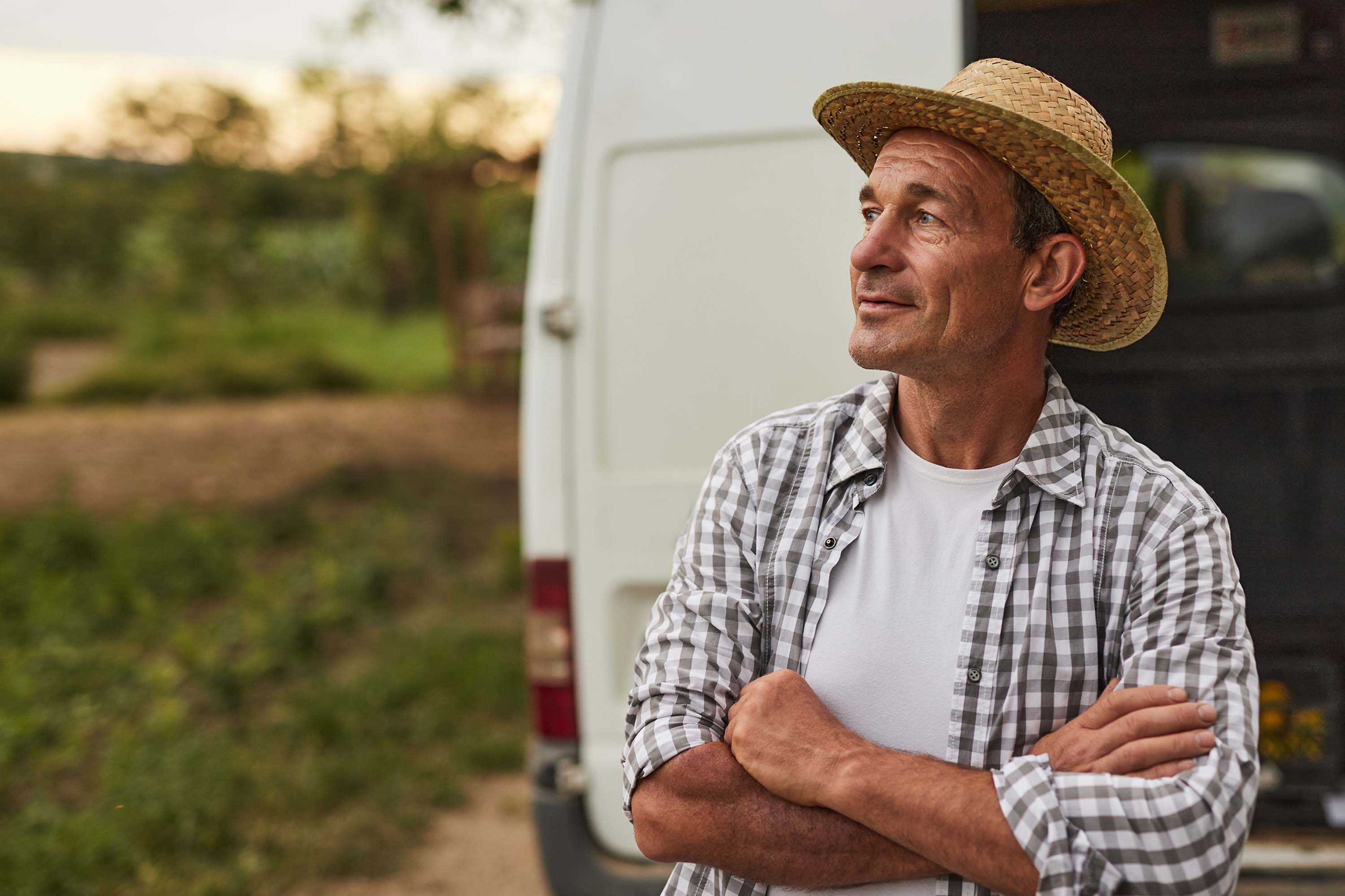 A man standing in front of the van