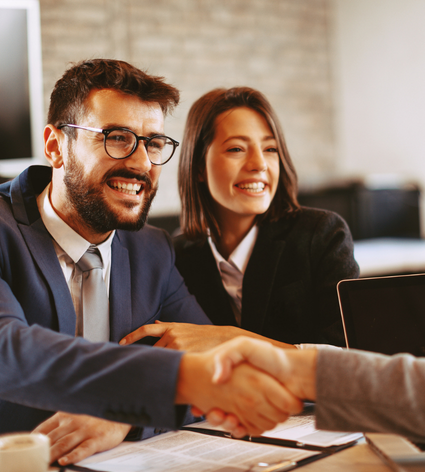 Couple shaking hands in agreement